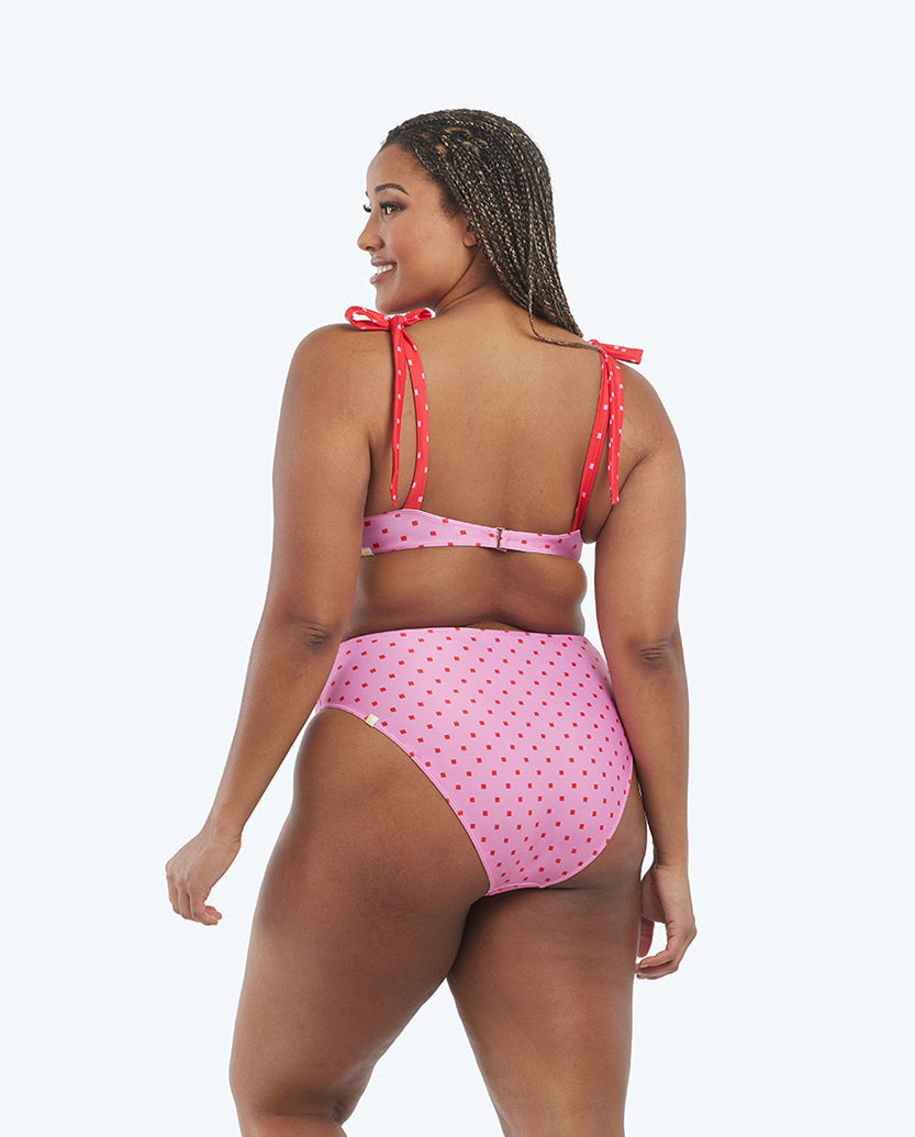 The limited-edition high leg mid rise bikini bottom