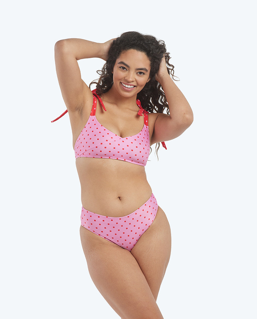 The limited-edition high leg mid rise bikini bottom